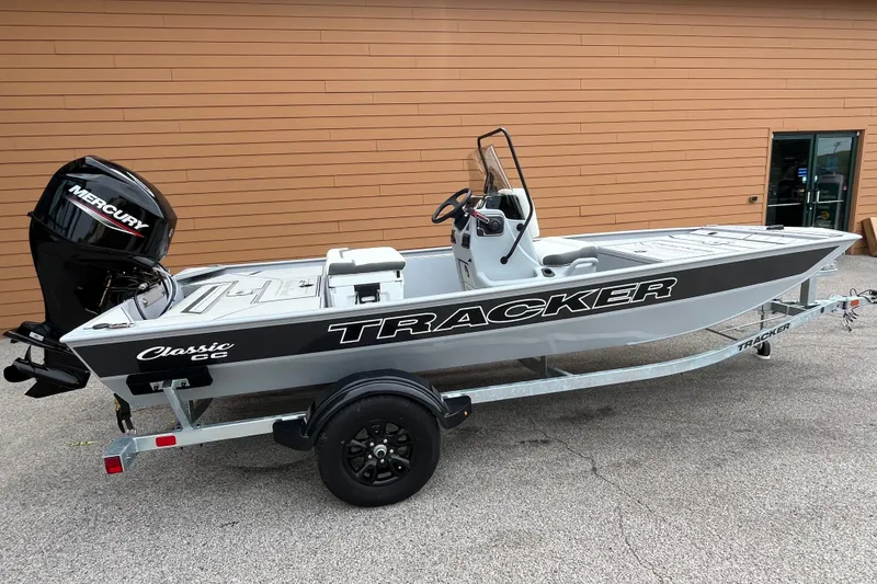 The Image of 2027 Tracker Bass Tracker Classic CC boat with Mercury engine on trailer. - 0
