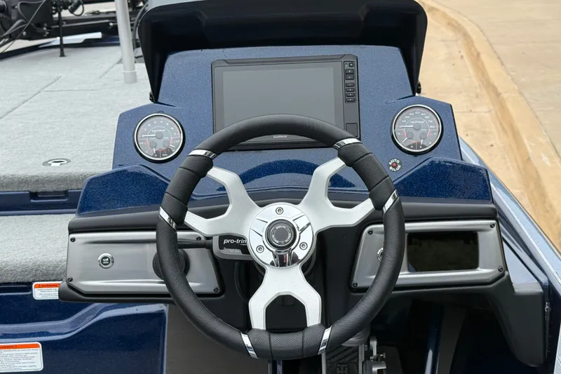 Slide: The Image of Steering console of 2027 Nitro Z20 XL Pro boat with modern dashboard and controls. - 7