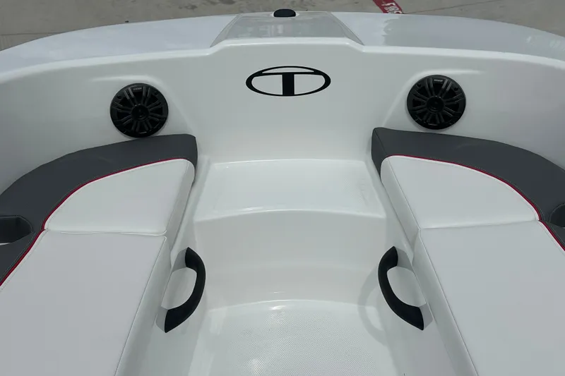 Slide: The Image of Interior of 2027 Tahoe T18 boat with cushioned seating and speakers. - 14