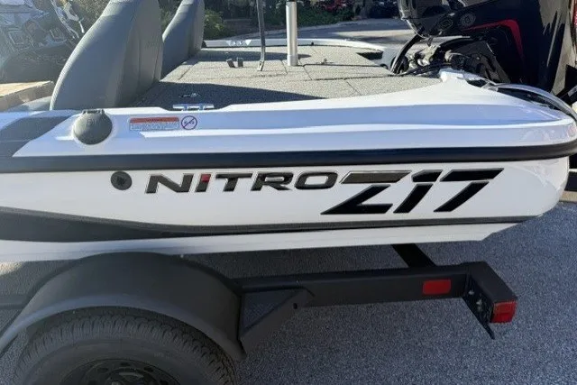 Slide: The Image of 2027 Nitro Z17 boat on trailer, showcasing sleek design and branding. - 7