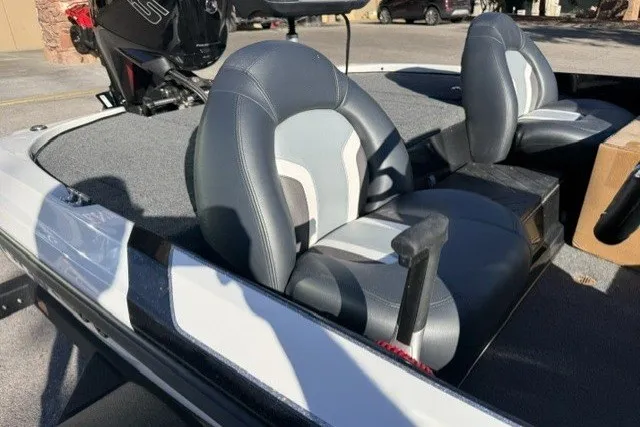Slide: The Image of 2027 Nitro Z17 boat interior with gray and white seats, showcasing modern design. - 11