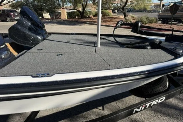 Slide: The Image of 2027 Nitro Z17 boat on trailer, featuring sleek design and spacious deck. - 8