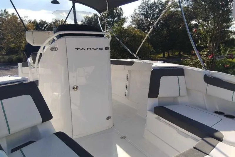 Slide: The Image of 2027 Tahoe 2150 CC boat interior with sleek seating and modern design. - 12