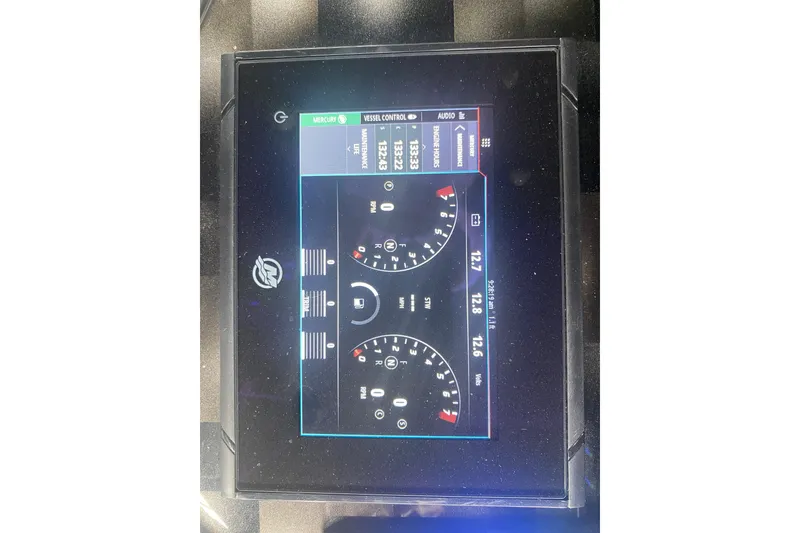 Slide: The Image of Dashboard display of AMP 333 CC 2025 model showing engine metrics and controls. - 19