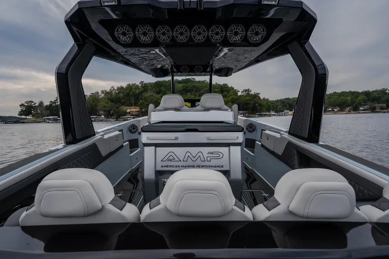 Slide: The Image of Luxury AMP 333 CC boat interior, 2025 model, featuring sleek design and advanced marine technology. - 37