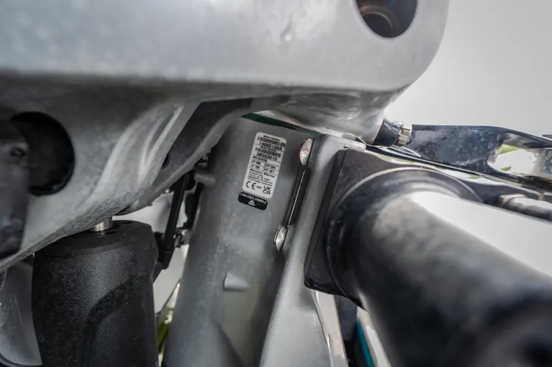 Slide: The Image of Close-up of AMP 333 CC 2025 machinery with visible label and components. - 63