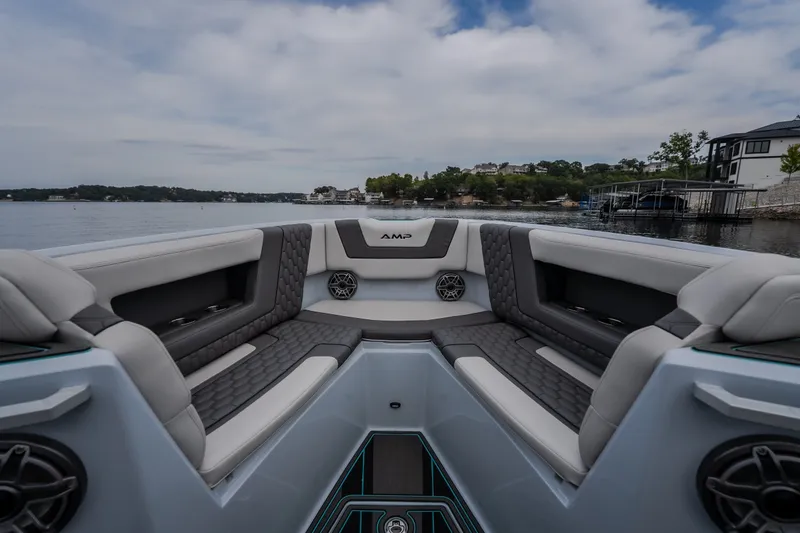 Slide: The Image of Luxurious interior of 2025 AMP 333 CC boat with waterfront view. - 20