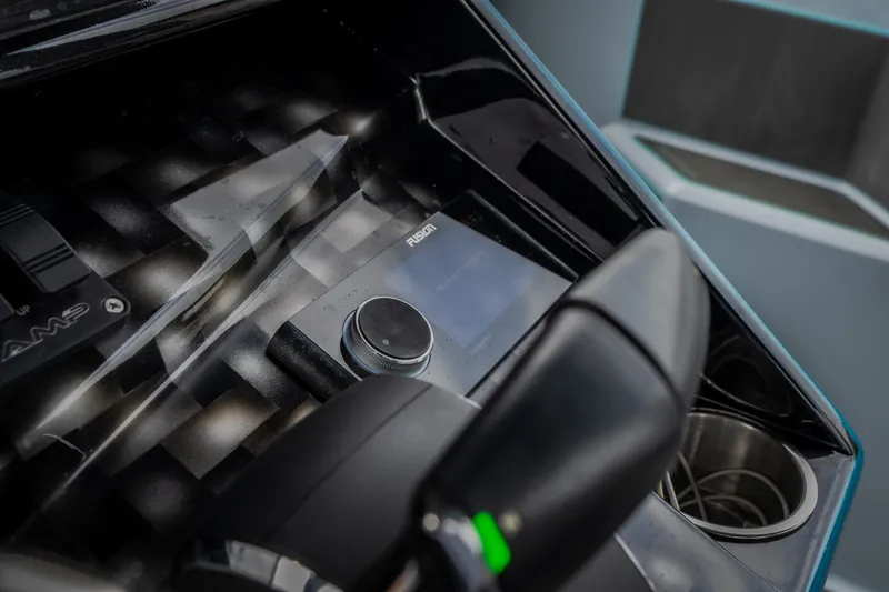 Slide: The Image of Close-up of AMP 333 CC 2025 dashboard with control panel and steering wheel. - 47