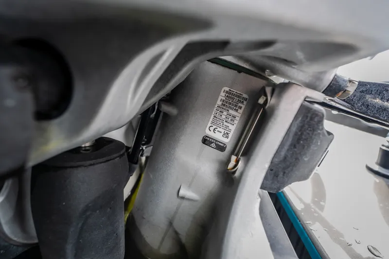 Slide: The Image of Close-up of AMP 333 CC 2025 engine component with visible label and serial number. - 61