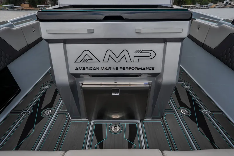 Slide: The Image of 2025 AMP 333 CC boat interior with sleek design and modern flooring. - 38