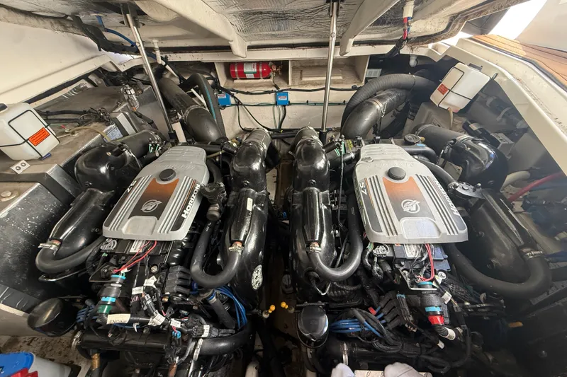Slide: The Image of Engine compartment of a 2010 Sea Ray Sundancer 330 with twin inboard motors. - 23