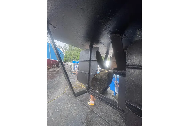 Slide: The Image of Underwater view of a 2007 Progressive Industrial boat propeller in a shipyard. - 17