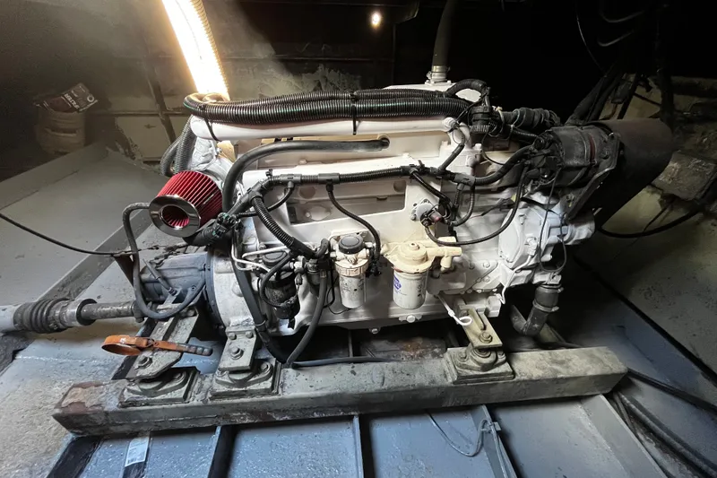 Slide: The Image of 2007 Progressive Industrial engine with red air filter, mounted on a metal frame. - 25