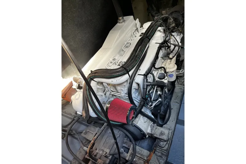 Slide: The Image of 2007 Progressive Industrial engine with red air filter and black cables. - 23