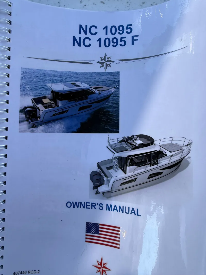 Slide: The Image of Jeanneau NC 1095 Coupe 2024 owner's manual featuring images of the boat on the water. - 37
