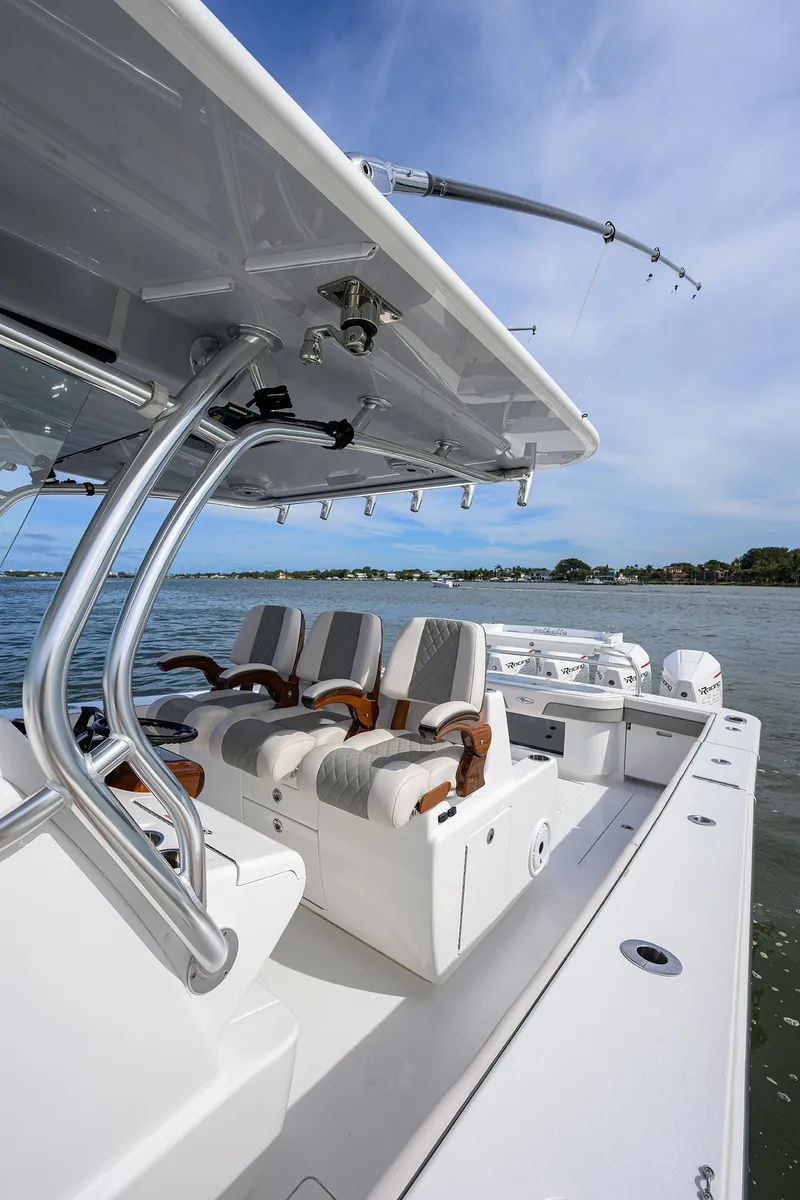 Slide: The Image of 2022 Valhalla Boatworks V-41 center console boat with luxurious seating on the water. - 36