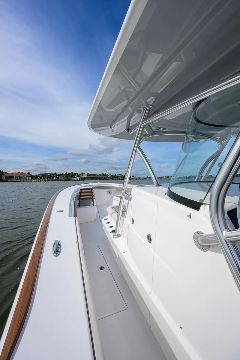 Slide: The Image of 2022 Valhalla Boatworks V-41 boat deck with clear skies and water view. - 8