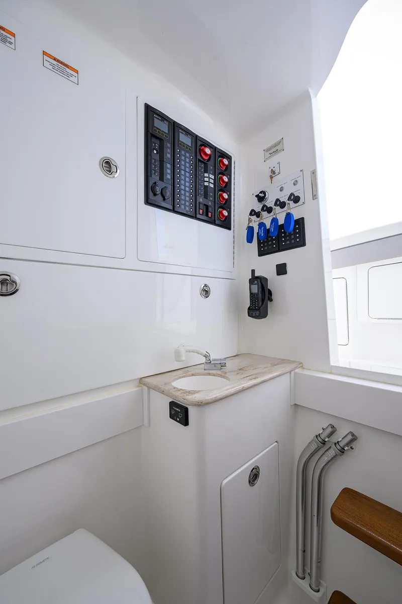 Slide: The Image of 2022 Valhalla Boatworks V-41 interior control panel and sink area. - 37