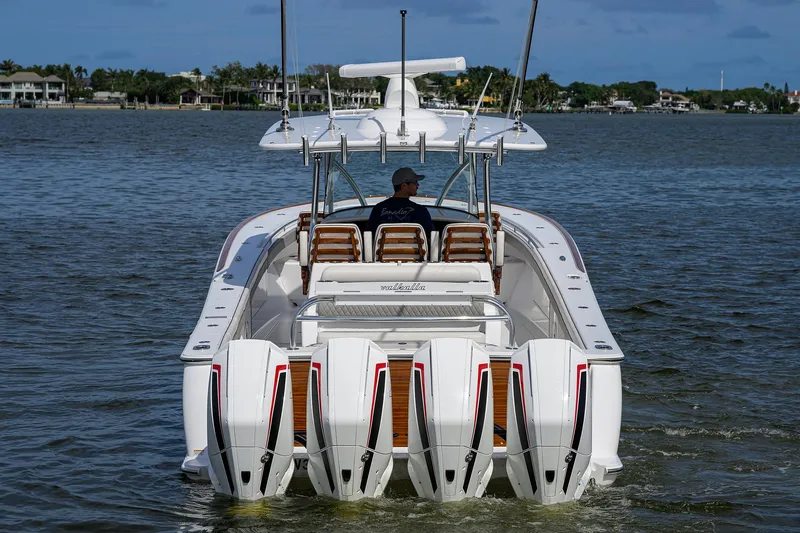 Slide: The Image of 2022 Valhalla Boatworks V-41 with quad outboard engines on the water. - 6
