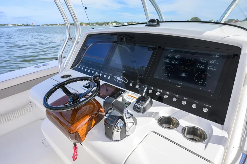 Slide: The Image of 2022 Valhalla Boatworks V-41 helm with advanced navigation system and controls. - 32
