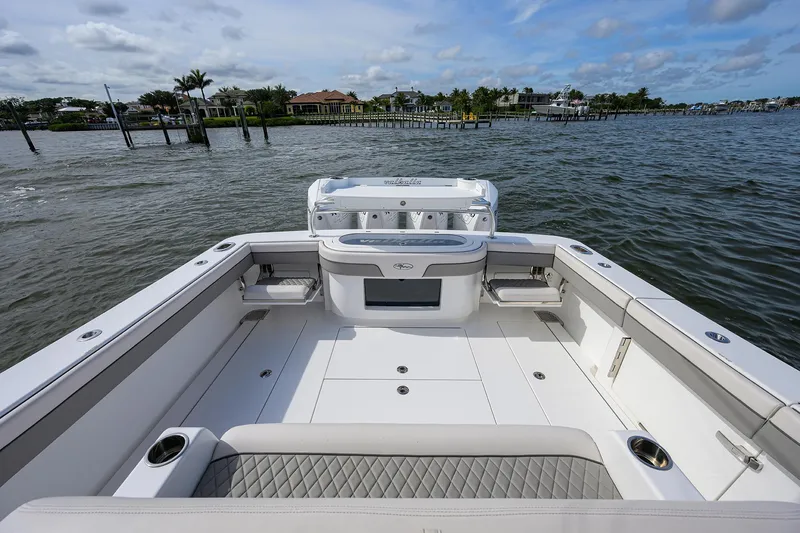 Slide: The Image of 2022 Valhalla Boatworks V-41, spacious deck with seating, on calm waters. - 22