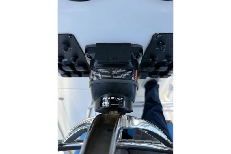 Slide: The Image of Close-up of SeaStar hydraulic steering system on 2005 Edgewater 245CC boat. - 6