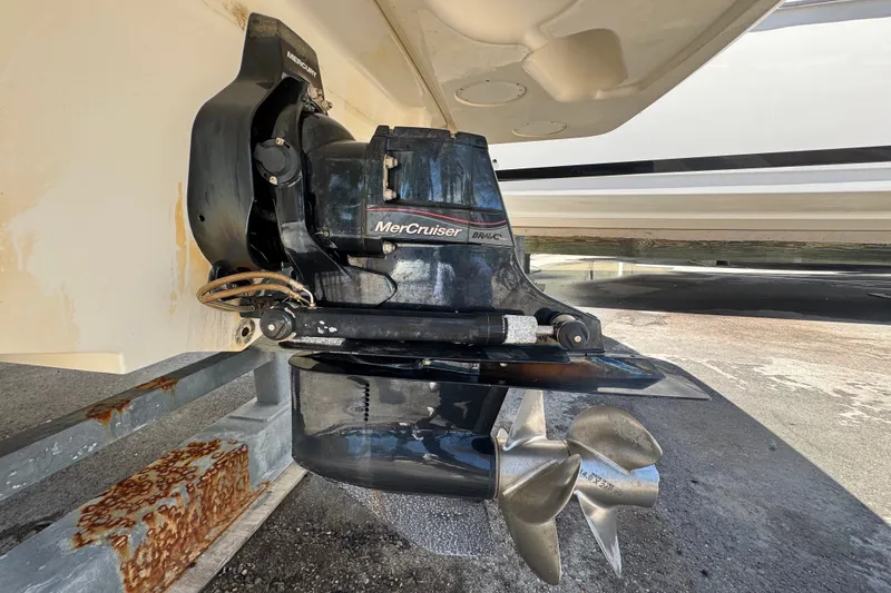 Slide: The Image of MerCruiser Bravo engine on a 2018 Sea Ray Sundancer 260 boat, displayed on a trailer. - 64