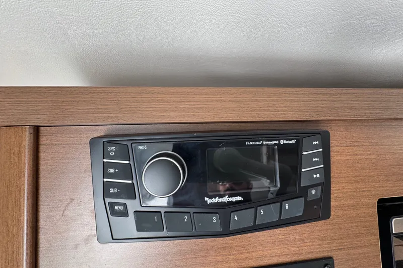 Slide: The Image of Rockford Fosgate PMX-5 stereo system in 2018 Sea Ray Sundancer 260 boat interior. - 35