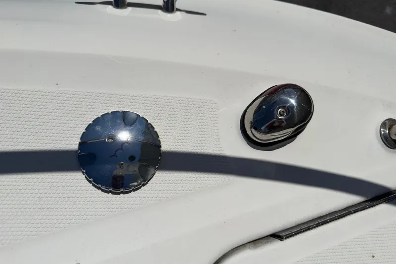Slide: The Image of Close-up of 2018 Sea Ray Sundancer 260 boat deck details, featuring chrome fittings. - 85