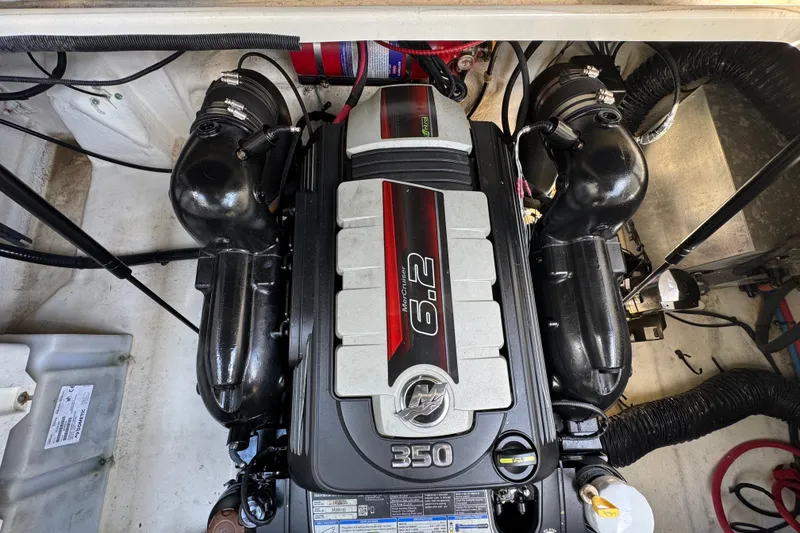Slide: The Image of Engine compartment of a 2018 Sea Ray Sundancer 260 with a 6.2L V8 engine. - 60