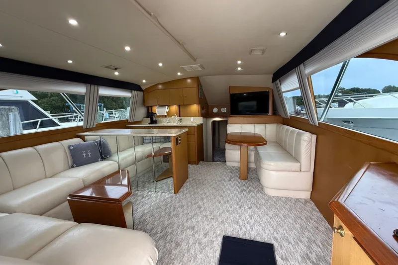 Slide: The Image of Luxurious interior of 2003 Ocean Yachts 43 Super Sport with plush seating and modern amenities. - 13