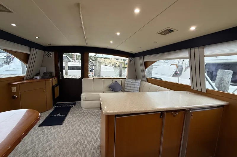 Slide: The Image of Luxurious interior of 2003 Ocean Yachts 43 Super Sport with plush seating and elegant design. - 17