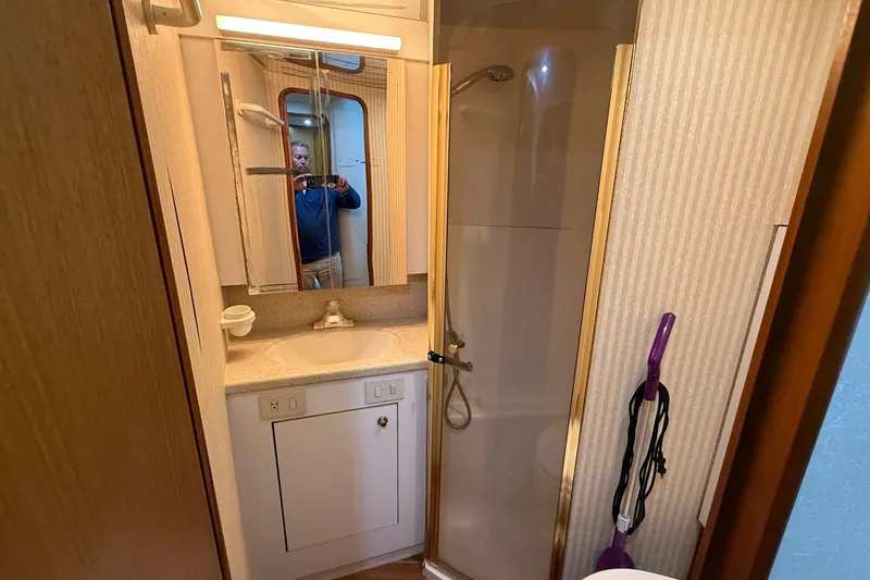 Slide: The Image of Bathroom interior of 2003 Ocean Yachts 43 Super Sport with shower and vanity. - 20