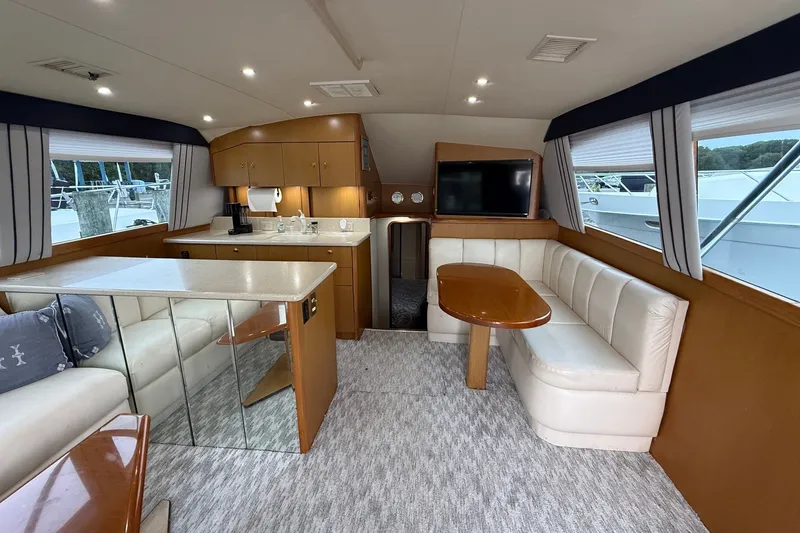 Slide: The Image of Luxurious interior of a 2003 Ocean Yachts 43 Super Sport with elegant seating and modern amenities. - 14