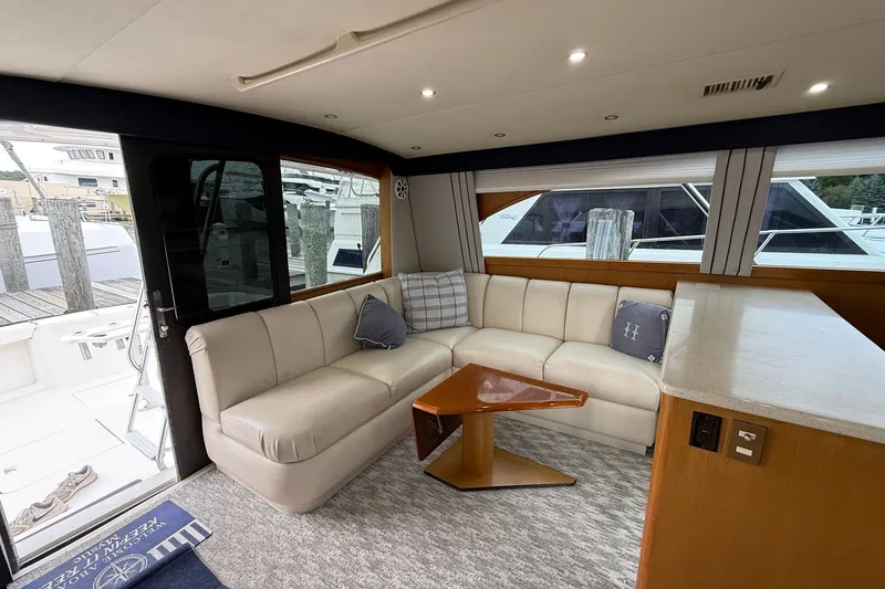 Slide: The Image of Luxurious interior of 2003 Ocean Yachts 43 Super Sport with plush seating and modern decor. - 16