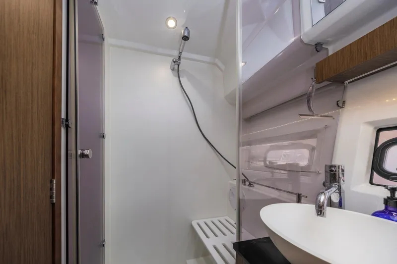 Slide: The Image of Modern bathroom interior of 2020 Jeanneau NC 1095 yacht with shower and sink. - 30
