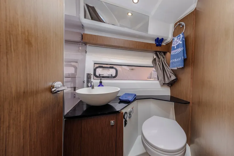 Slide: The Image of Modern bathroom in 2020 Jeanneau NC 1095 boat with sink and toilet. - 29