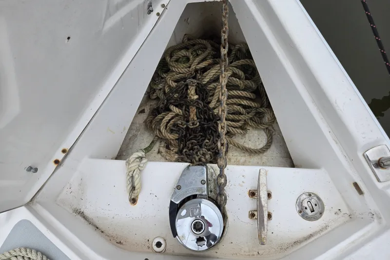 Slide: The Image of Anchor locker of 2006 Hunter 36 sailboat with ropes and chain. - 7