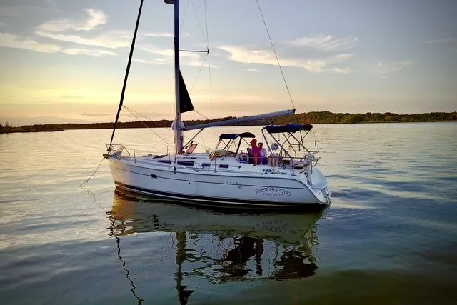 Slide: The Image of Sailboat on calm water at sunset, Hunter 36 model, 2006. - 47