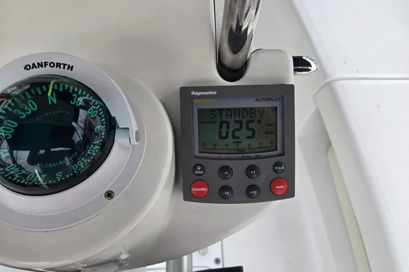Slide: The Image of Boat compass and autopilot system on a 2006 Hunter 36 sailboat. - 42