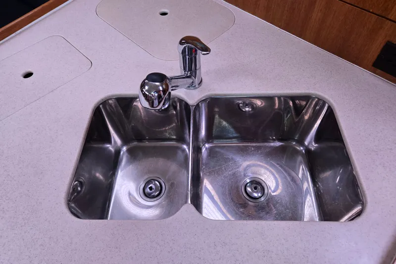 Slide: The Image of Stainless steel double sink with modern faucet on Hunter 36 yacht, 2006 model. - 28