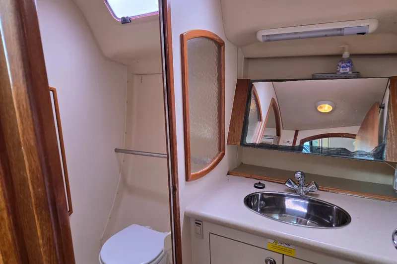 Slide: The Image of Bathroom interior of a 2006 Hunter 36 sailboat with sink and toilet. - 34