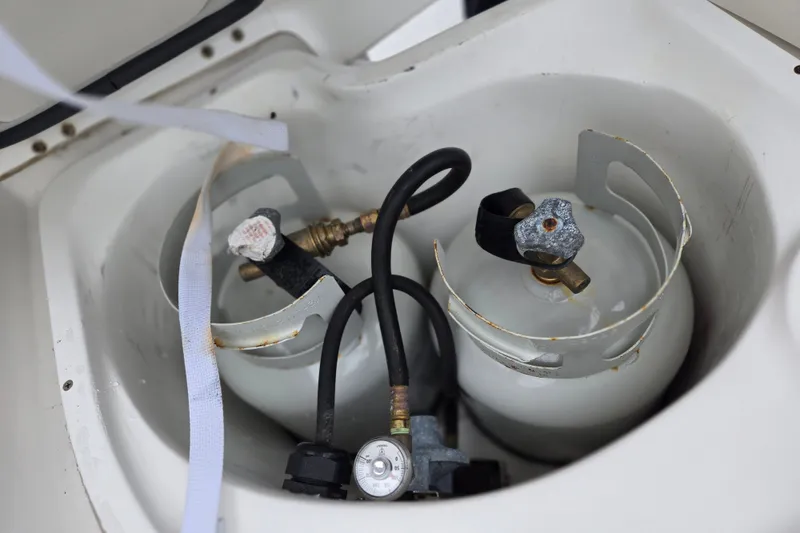 Slide: The Image of Propane tanks in storage compartment of 2006 Hunter 36 boat. - 9