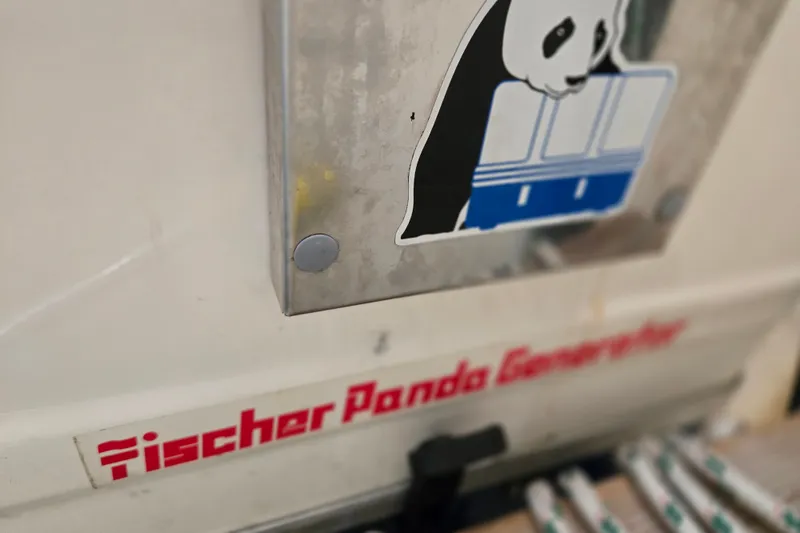 Slide: The Image of Fischer Panda Generator with panda logo on a 2006 Hunter 36. - 10