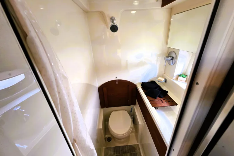 Slide: The Image of Luxurious bathroom in 2012 Sea Ray 410 Sundancer yacht with shower and toilet. - 25
