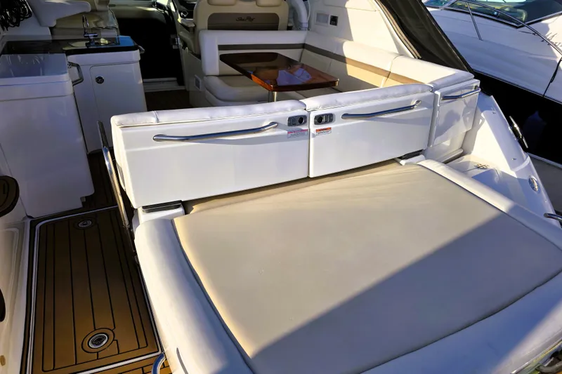 Slide: The Image of Luxurious interior of 2012 Sea Ray 410 Sundancer yacht with seating and table. - 4