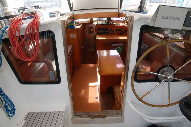 Slide: The Image of Interior view of 2000 Garcia 48 Raised Salon yacht with navigation equipment. - 49