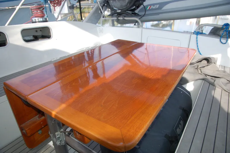 Slide: The Image of Polished wooden table on Garcia 48 Raised Salon yacht, 2000 model. - 34