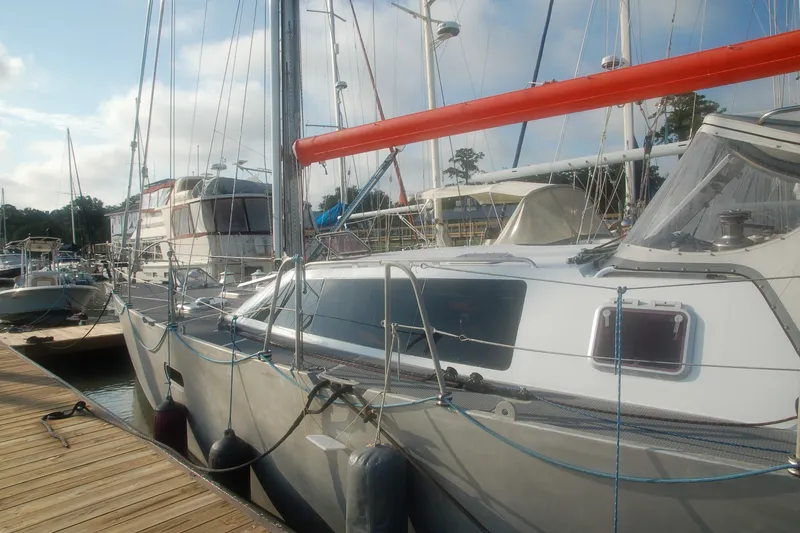 Slide: The Image of Sailboat Garcia 48 Raised Salon 2000 docked at marina with clear sky. - 10
