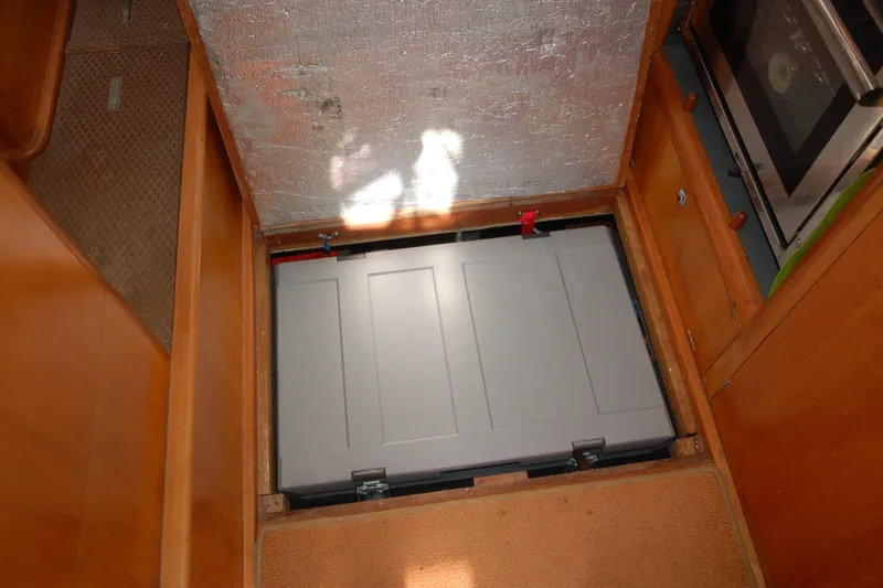 Slide: The Image of Hidden storage compartment in 2000 Garcia 48 Raised Salon yacht interior. - 78